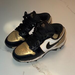 Nike Kids Black and Gold Cleats size youth 1.5